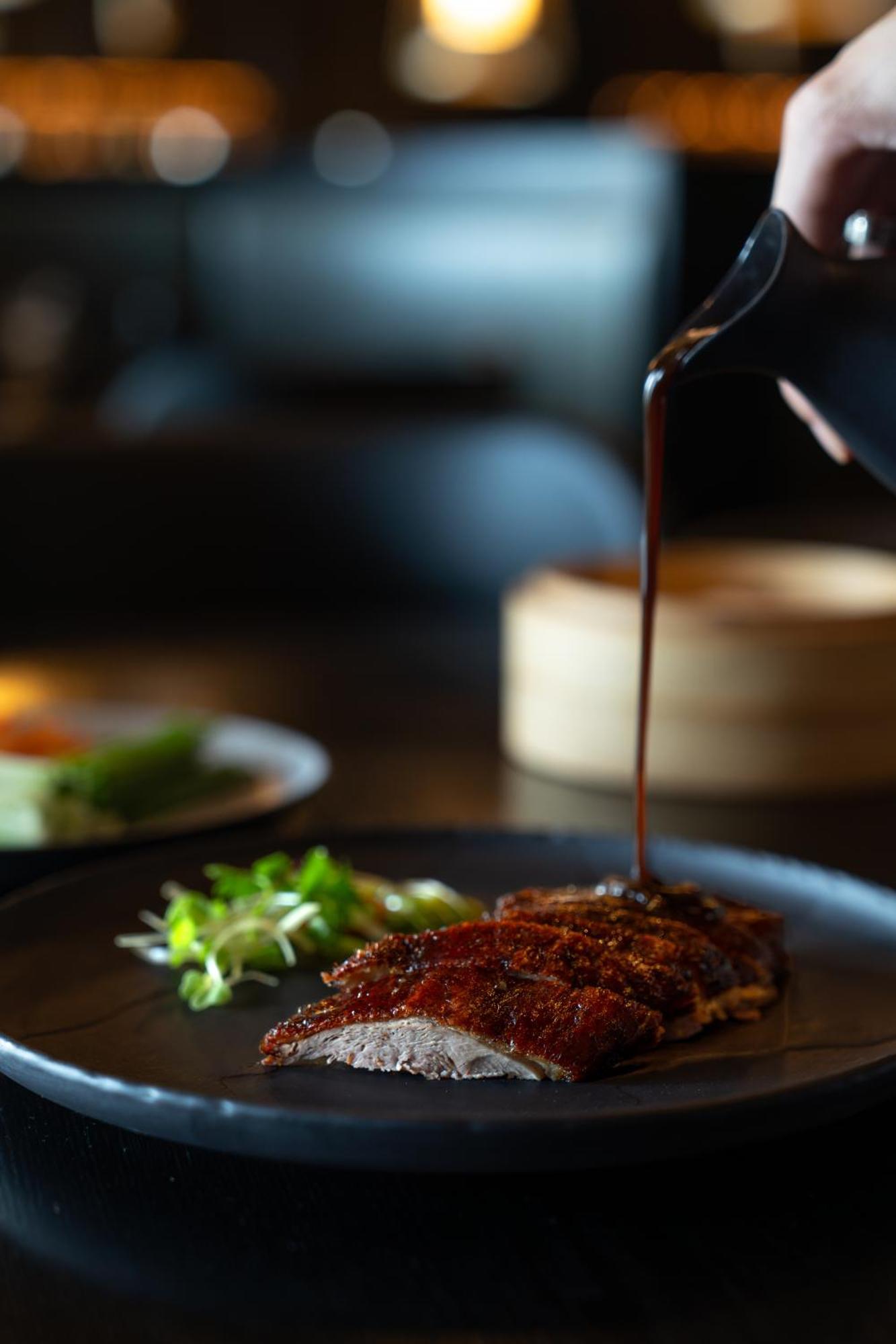 Lux* Belle Mare Resort & Villas Экстерьер фото Soy sauce being drizzled onto a dish