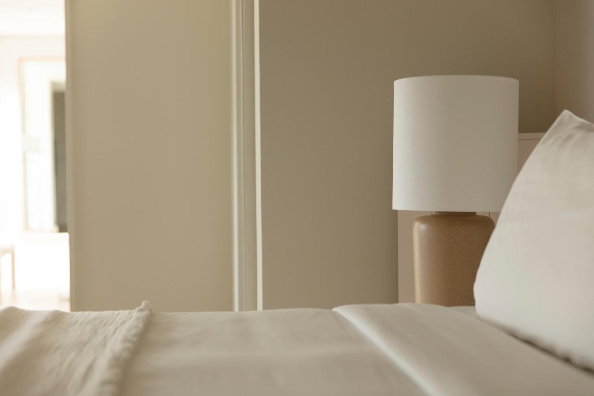 Lux* Belle Mare Resort & Villas Экстерьер фото A lamp on a bedside table